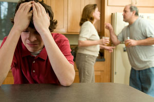 bigstockphoto_Parents_Fight_Son_Suffers_300X199